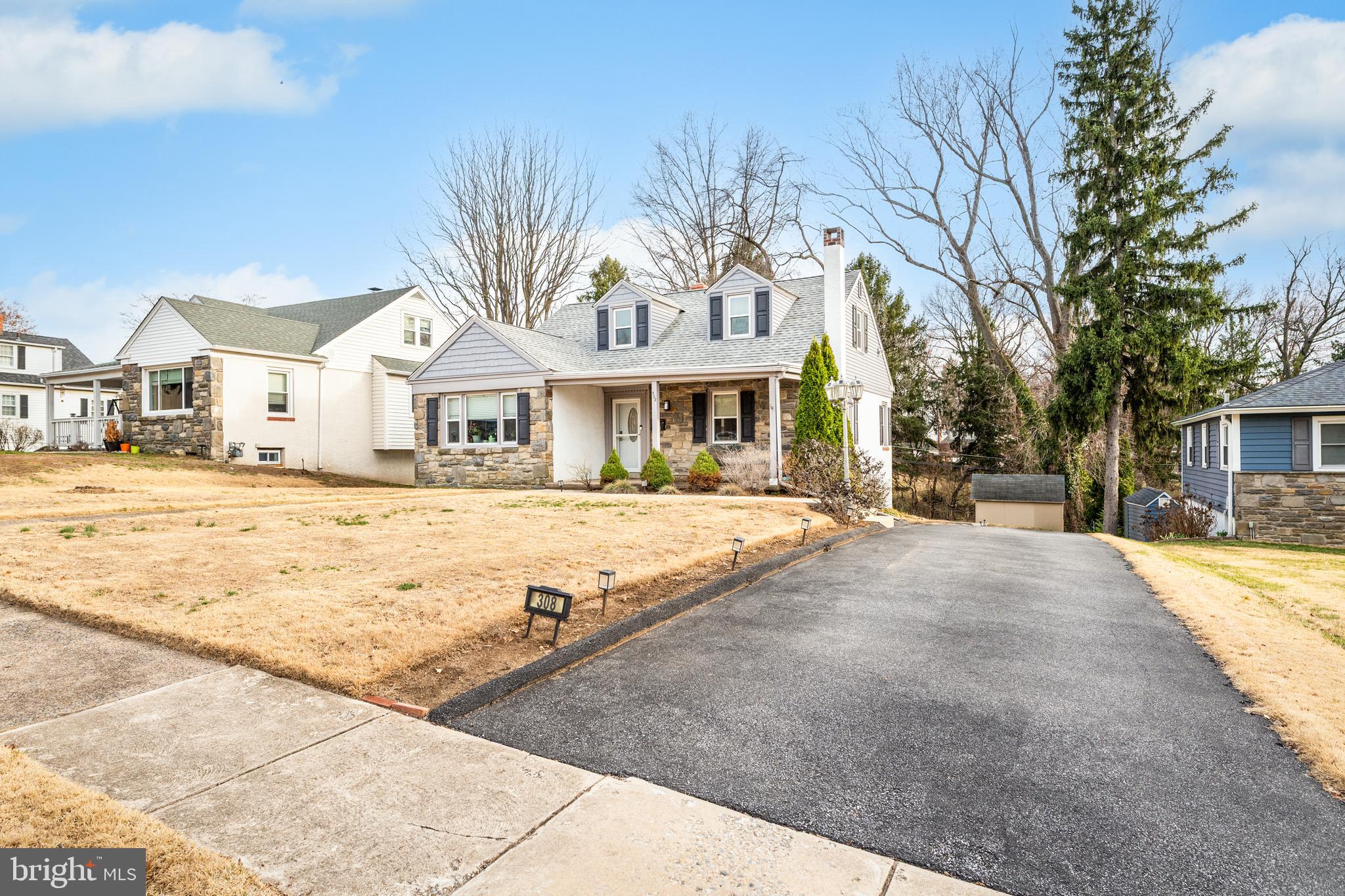 308 Providence Road Morton, PA 19070 - Photo 3 of 30 a front view of a house with a yard