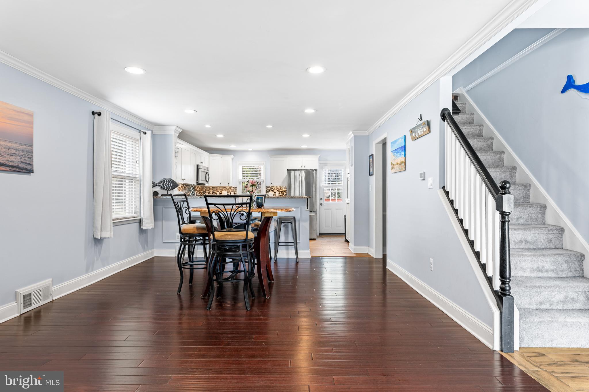 308 Providence Road Morton, PA 19070 - Photo 5 of 30 a dining room with furniture wooden floor and a rug