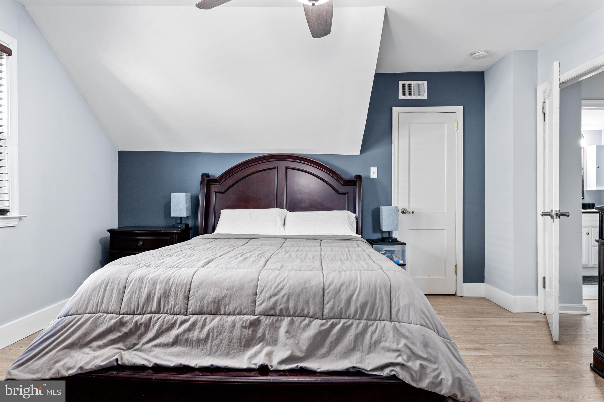 308 Providence Road Morton, PA 19070 - Photo 10 of 30 a bedroom with a bed and mirror