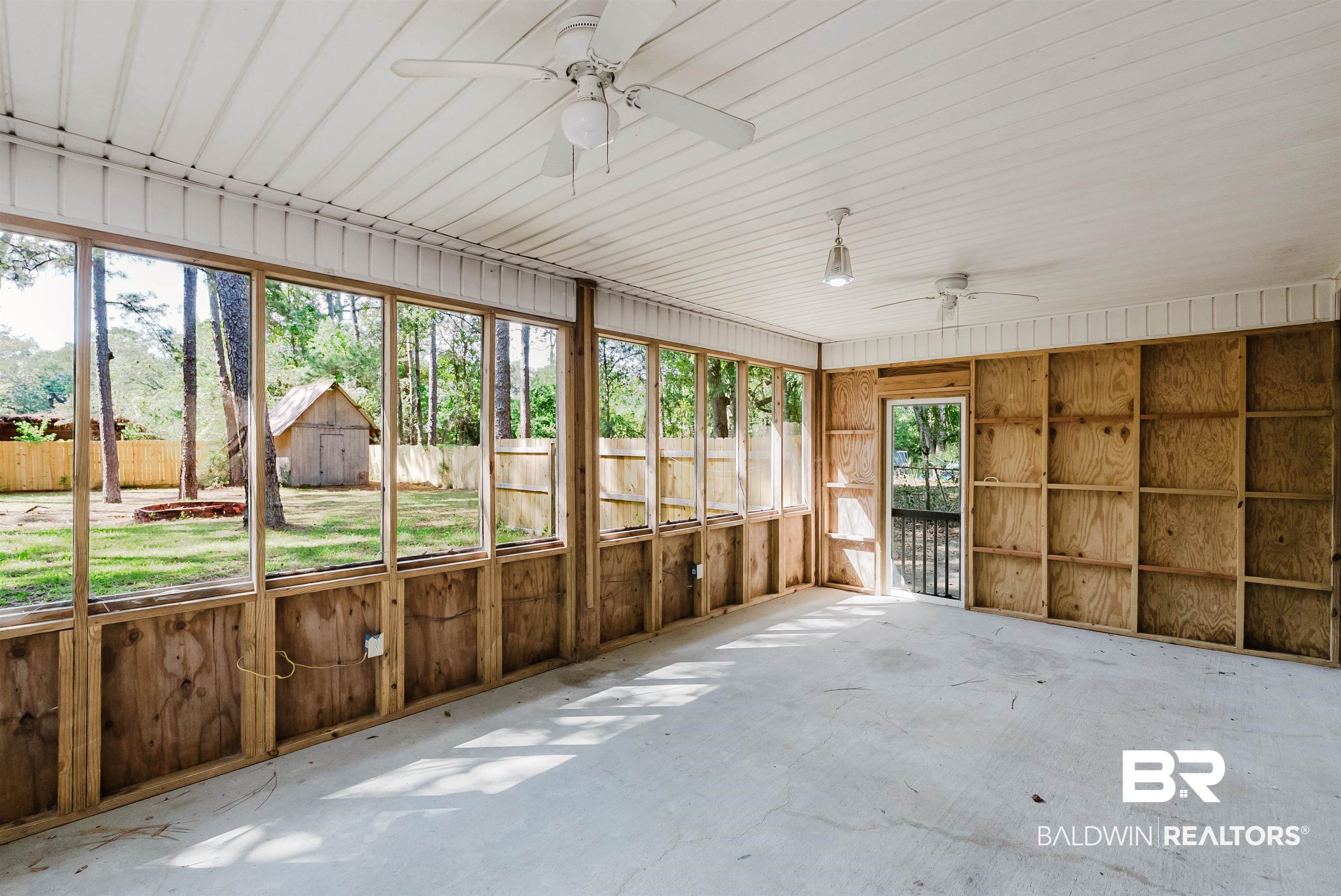 14185 Jackson Lane Foley, AL 36535 - Photo 14 of 16 Unfurnished sunroom featuring ceiling fan