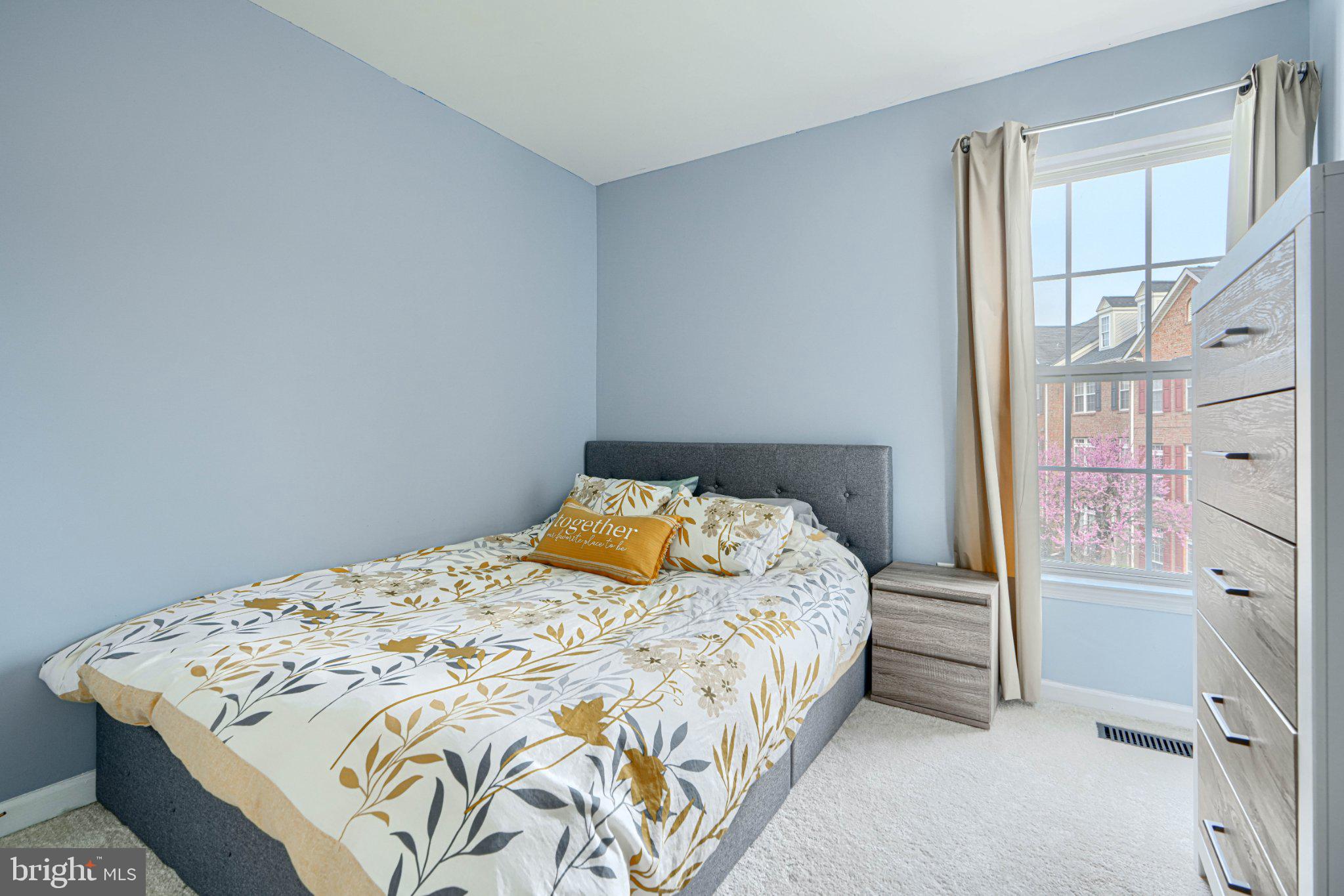 9307 Summit View Way Perry Hall, MD 21128 - Photo 16 of 26 a bedroom with a bed and a window