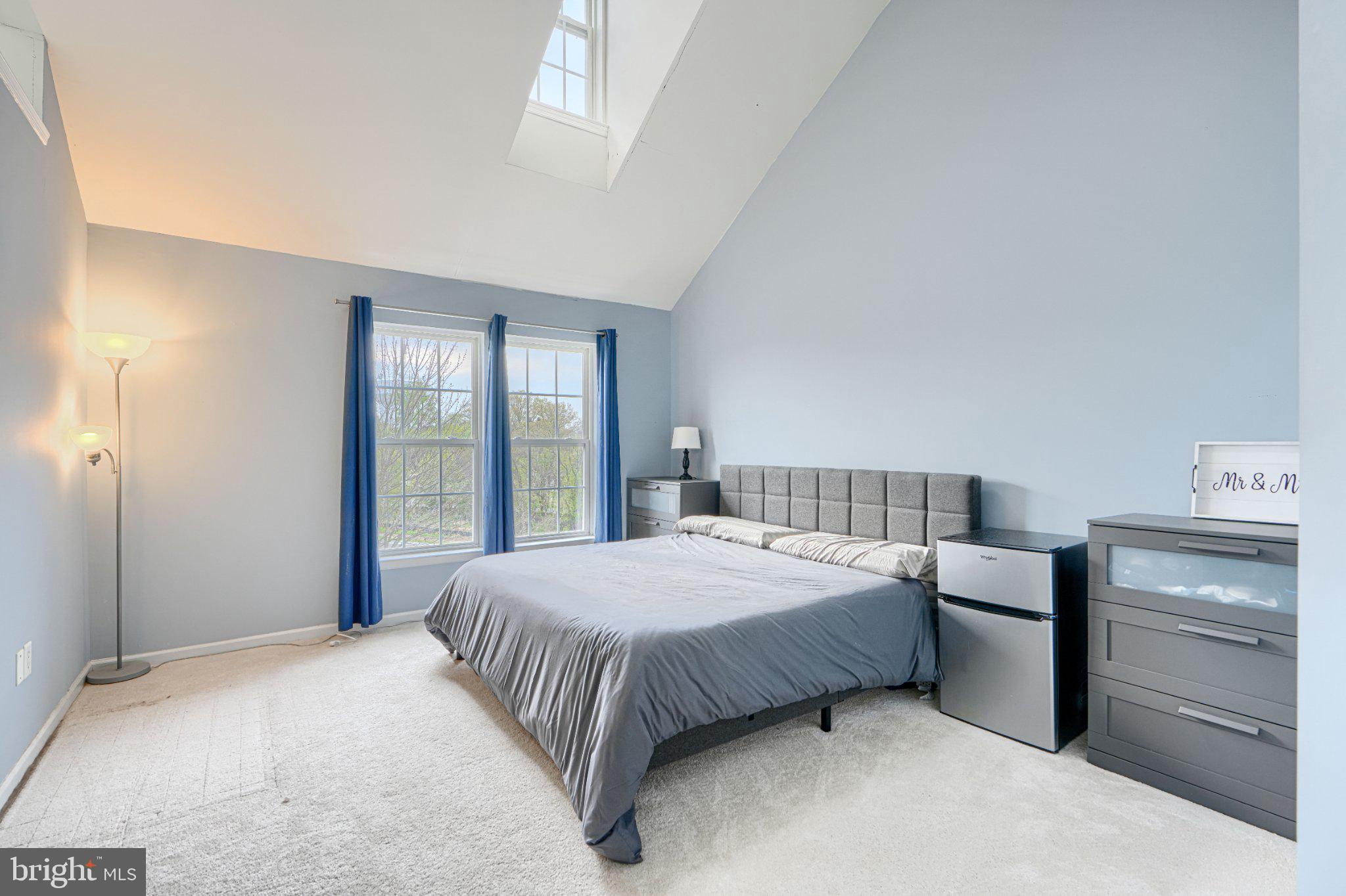 9307 Summit View Way Perry Hall, MD 21128 - Photo 21 of 26 a bedroom with a bed and large window