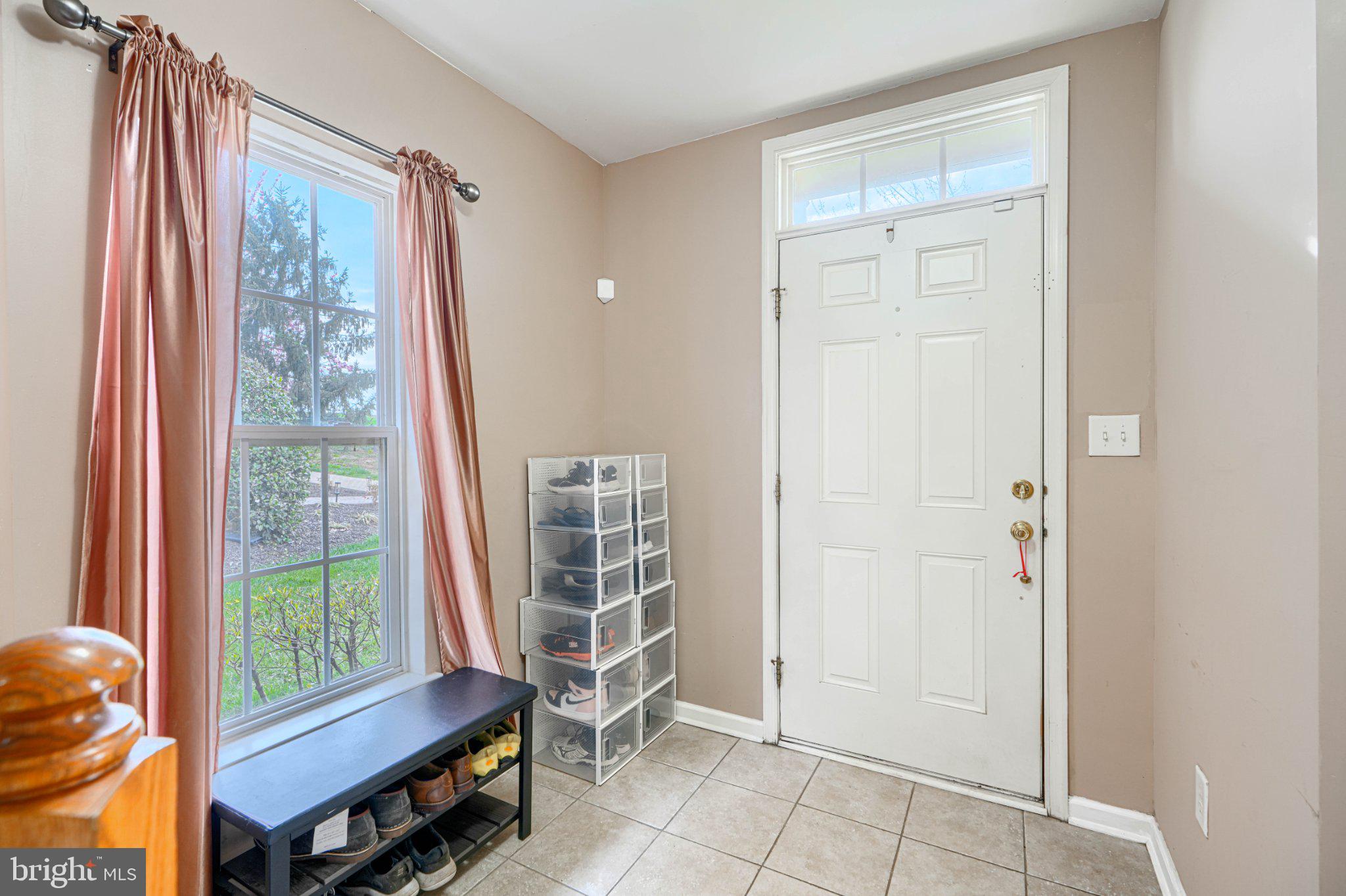 9307 Summit View Way Perry Hall, MD 21128 - Photo 3 of 26 a room with a bed and a window