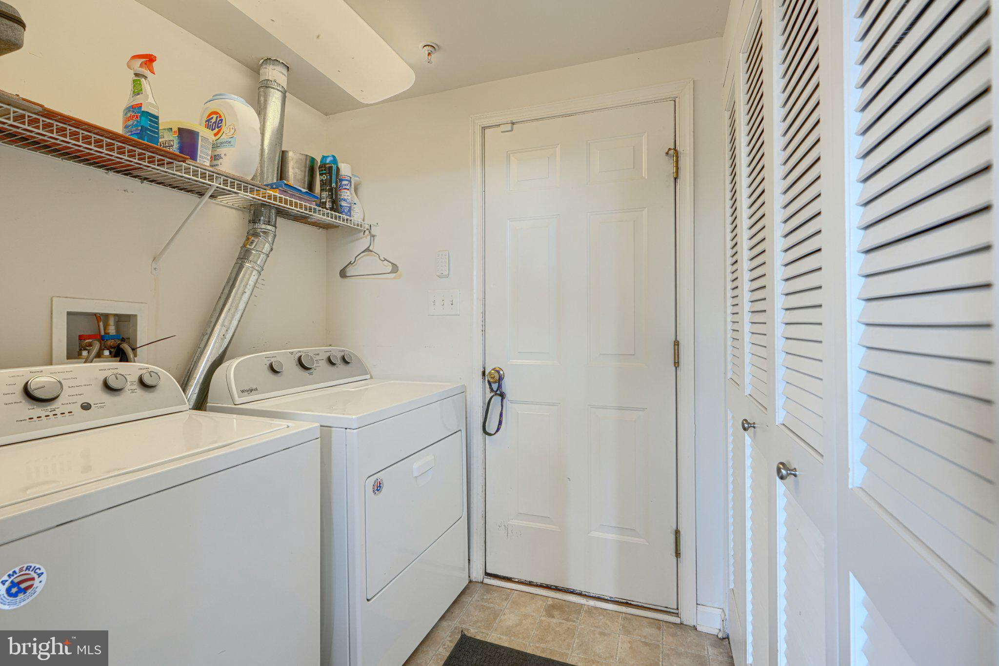 9307 Summit View Way Perry Hall, MD 21128 - Photo 4 of 26 a view of storage and utility room with washer and dryer