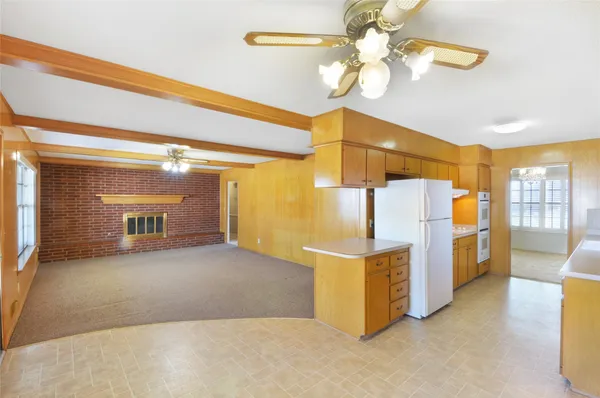 a view of a kitchen with a chandelier