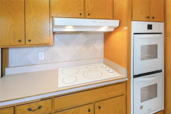 a view of kitchen and utility room