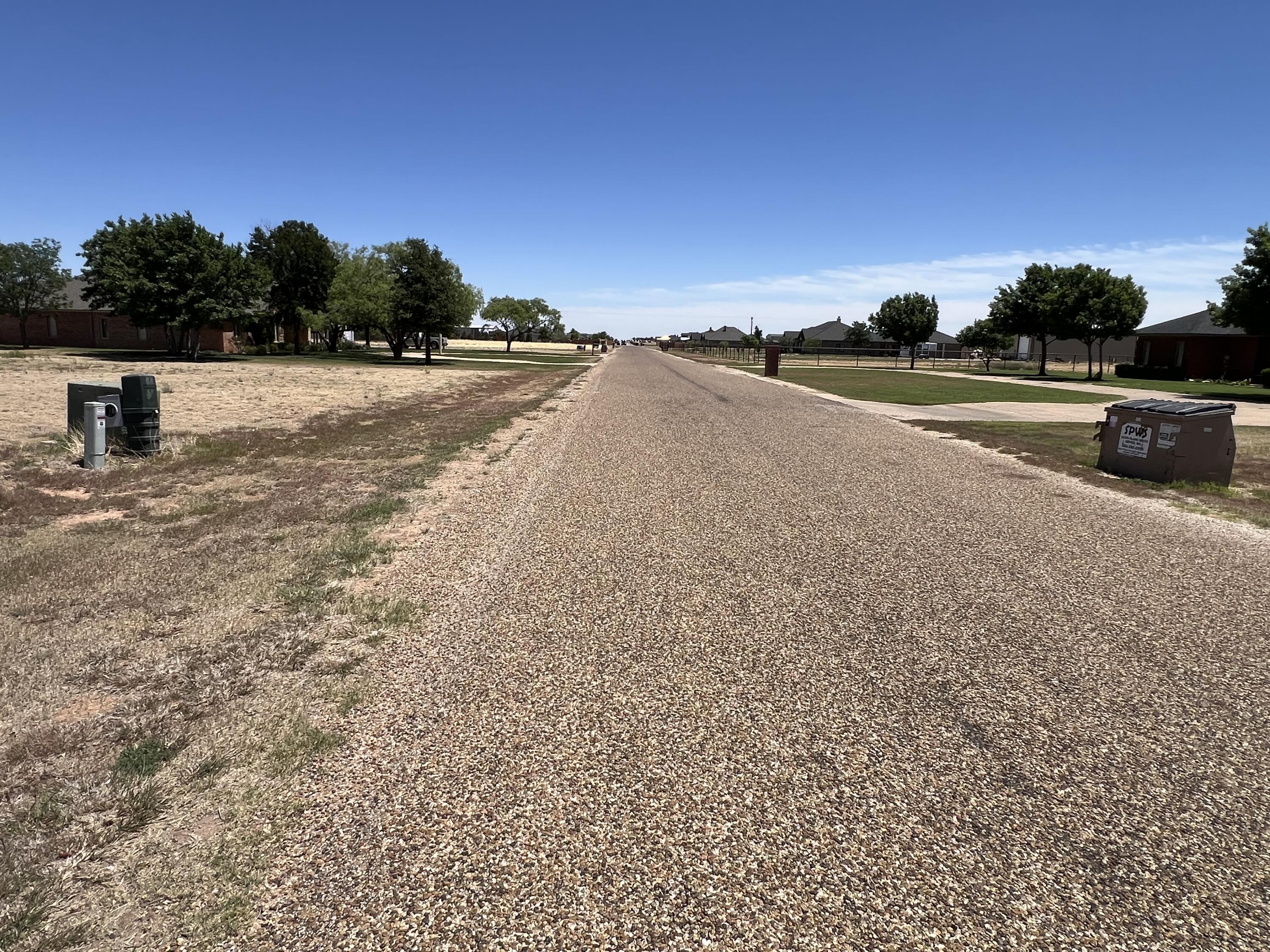 5402 C R 7920 Lubbock, TX 79424 - Photo 5 of 7 a view of a road with a yard