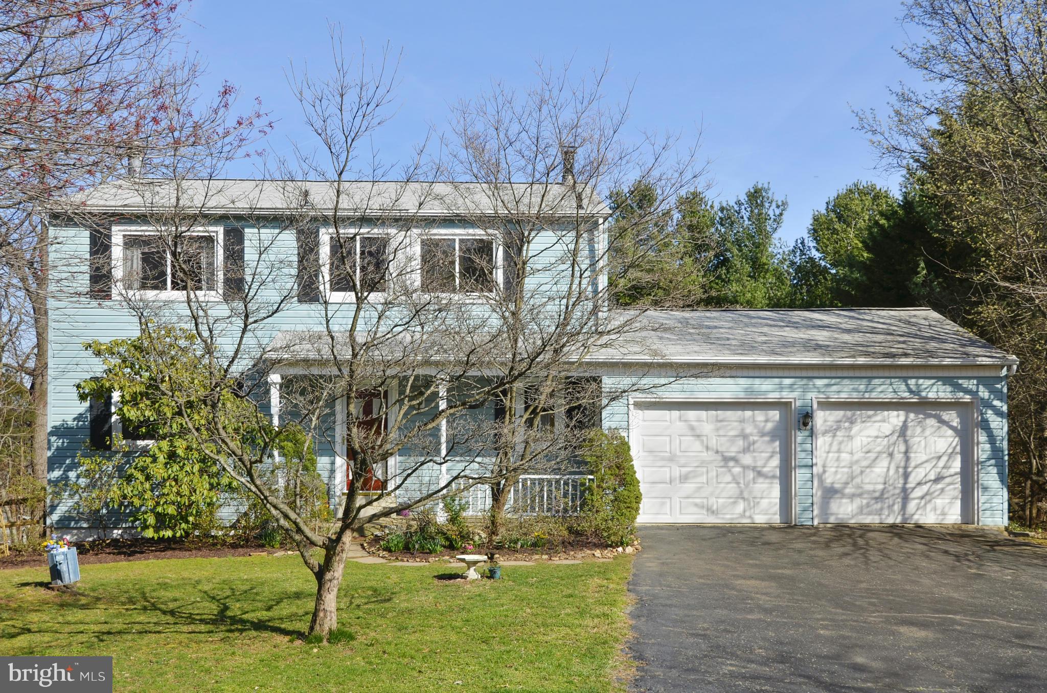 a house with trees in the background