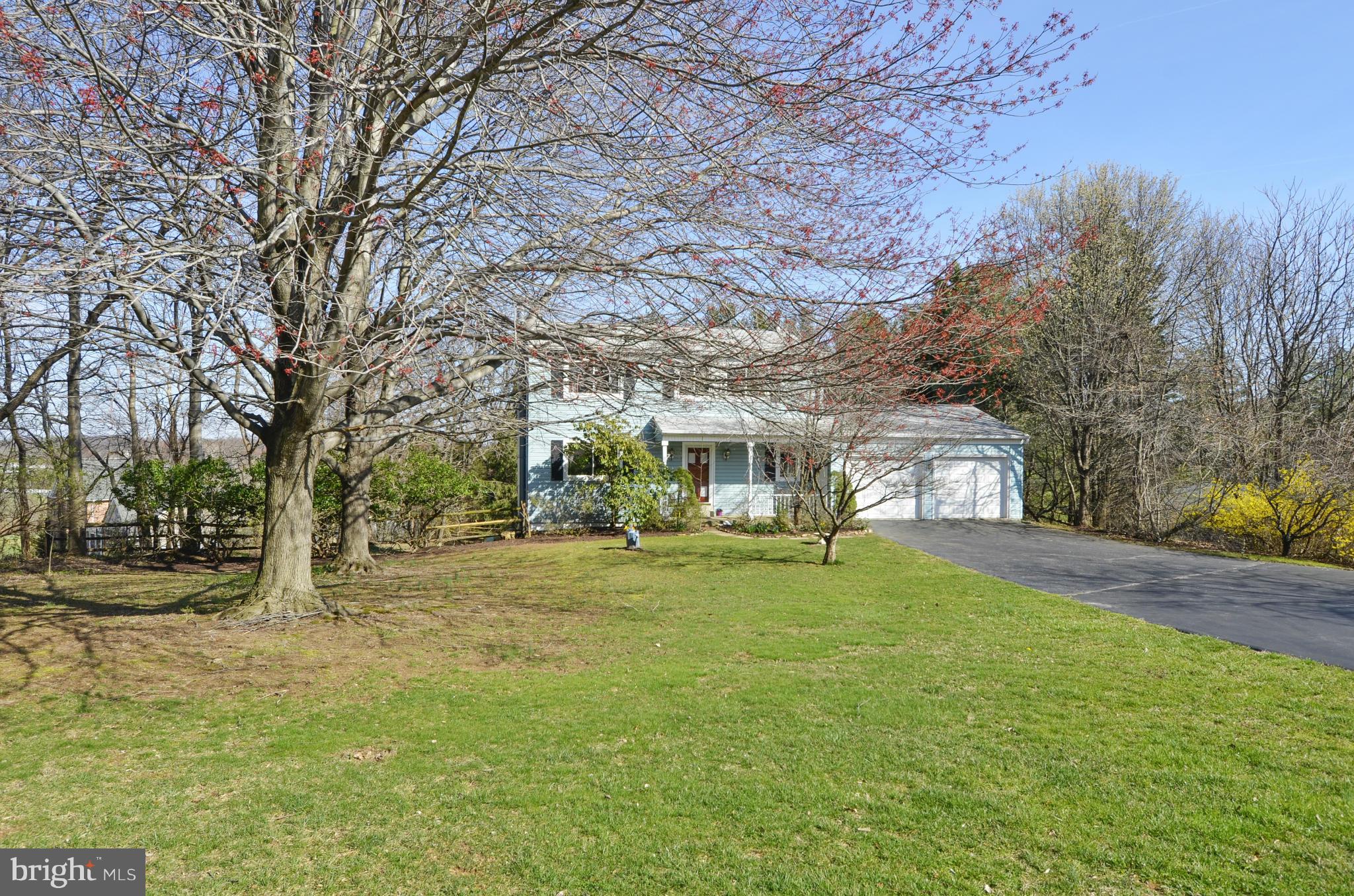 9833 Moyer Road Damascus, MD 20872 - Photo 21 of 26 a view of a yard with a house
