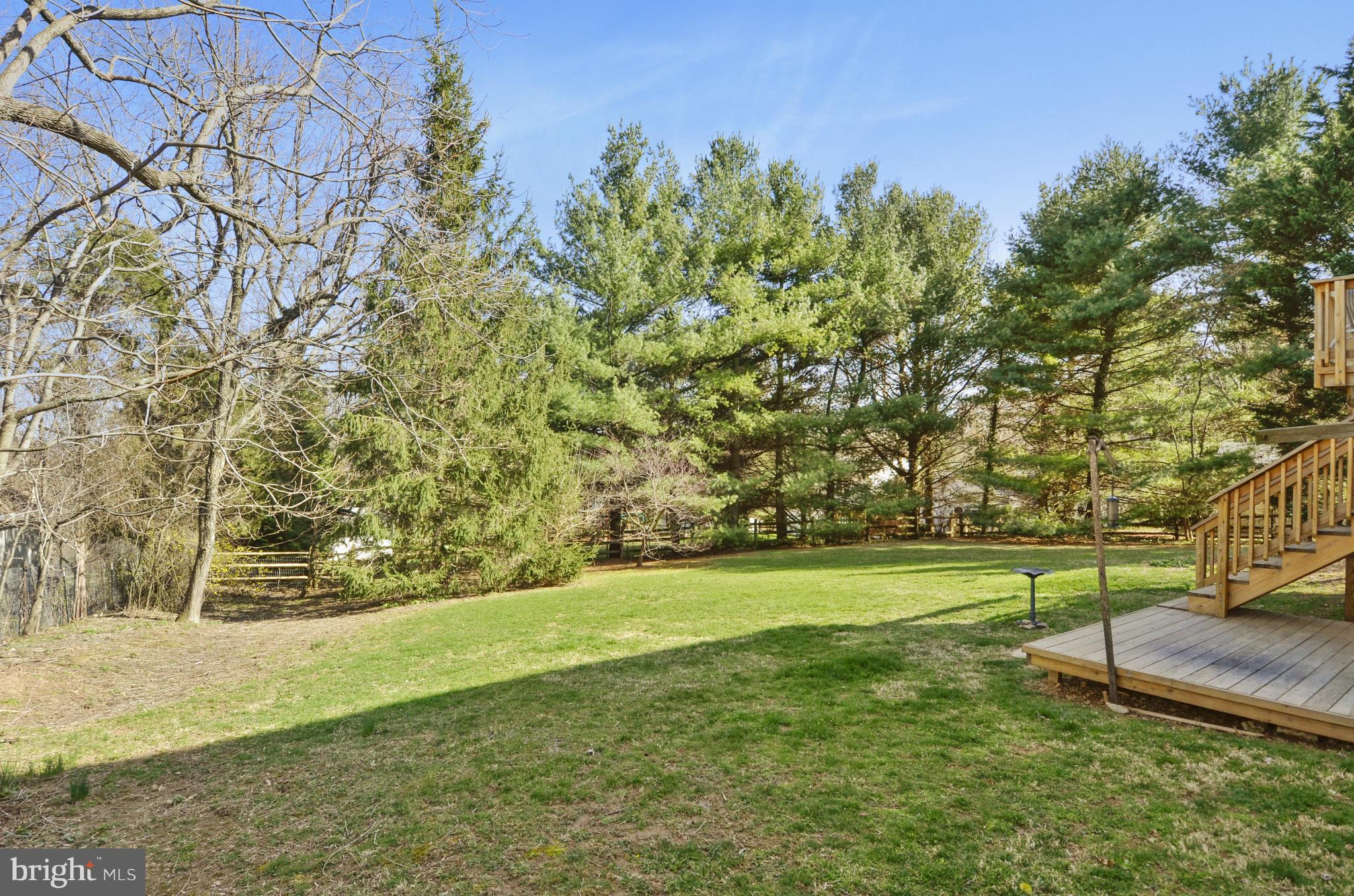 9833 Moyer Road Damascus, MD 20872 - Photo 23 of 26 a view of a field with grass and trees