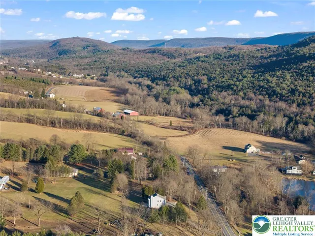 a view of a hallway with the wooden door
