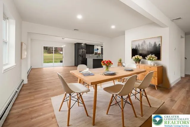 a view of kitchen with wooden floor
