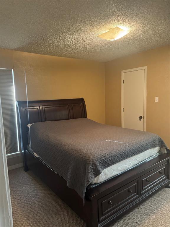 393 VZ County Road, Unit 4125 Ben Wheeler, TX 75754 - Photo 13 of 23 a bedroom with a bed and a window