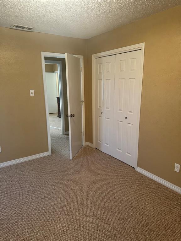 393 VZ County Road, Unit 4125 Ben Wheeler, TX 75754 - Photo 19 of 23 an empty room with closet area