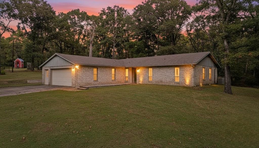 393 VZ County Road, Unit 4125 Ben Wheeler, TX 75754 - Photo 3 of 23 a house with trees in front of it
