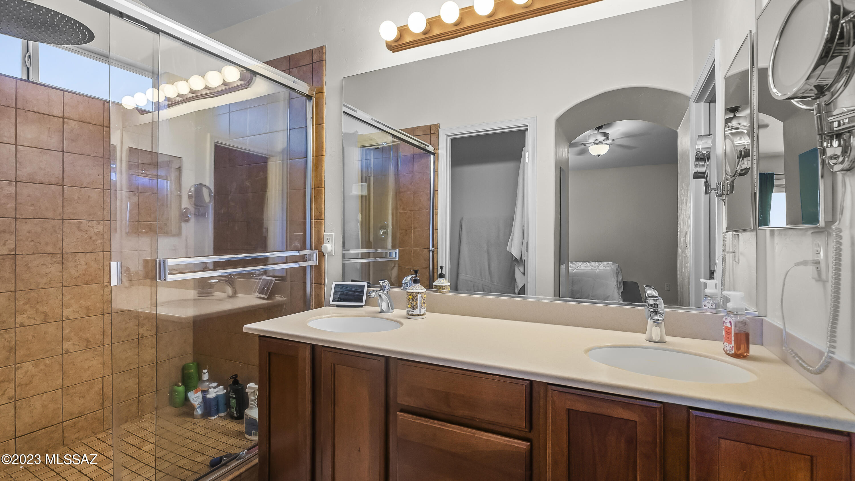 1858 Tijuana Court Rio Rico, AZ 85648 - Photo 20 of 33 a bathroom with a sink and a mirror