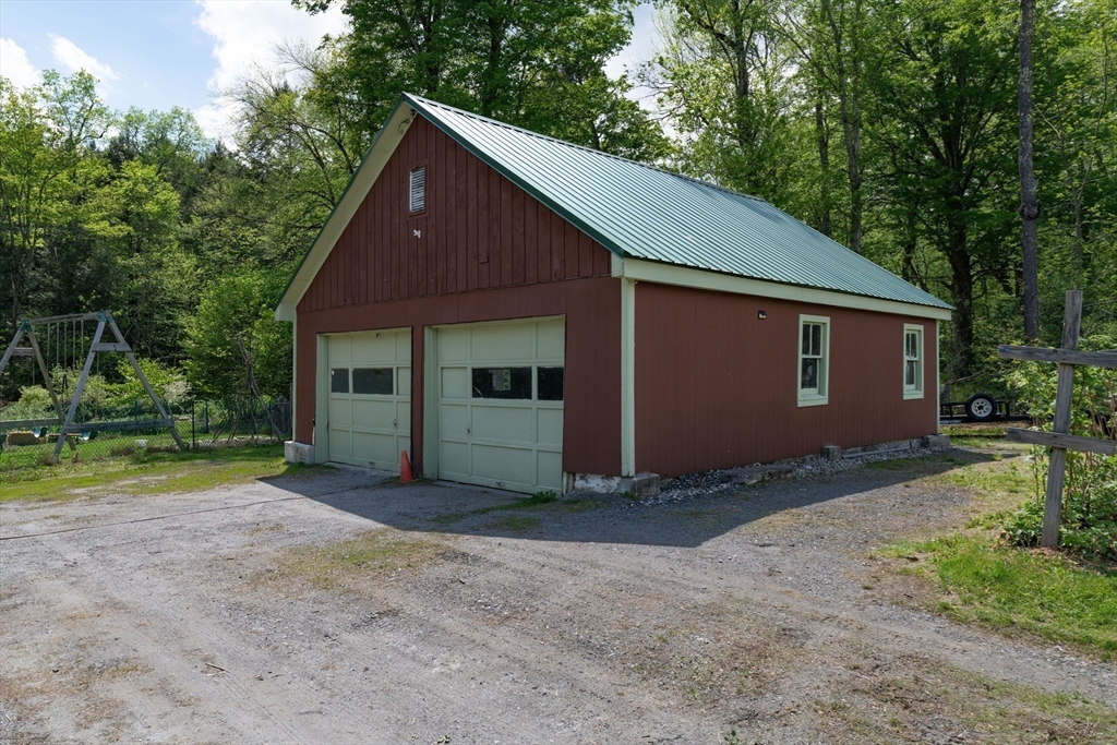 425 Dingle Road Worthington, MA 01098 - Photo 28 of 32 a view of a house with yard and a garden