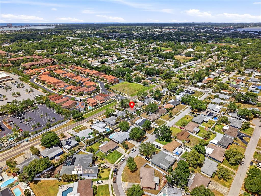 4939 100th Way North St. Petersburg, FL 33708 - Photo 42 of 43 an aerial view of residential houses with outdoor space