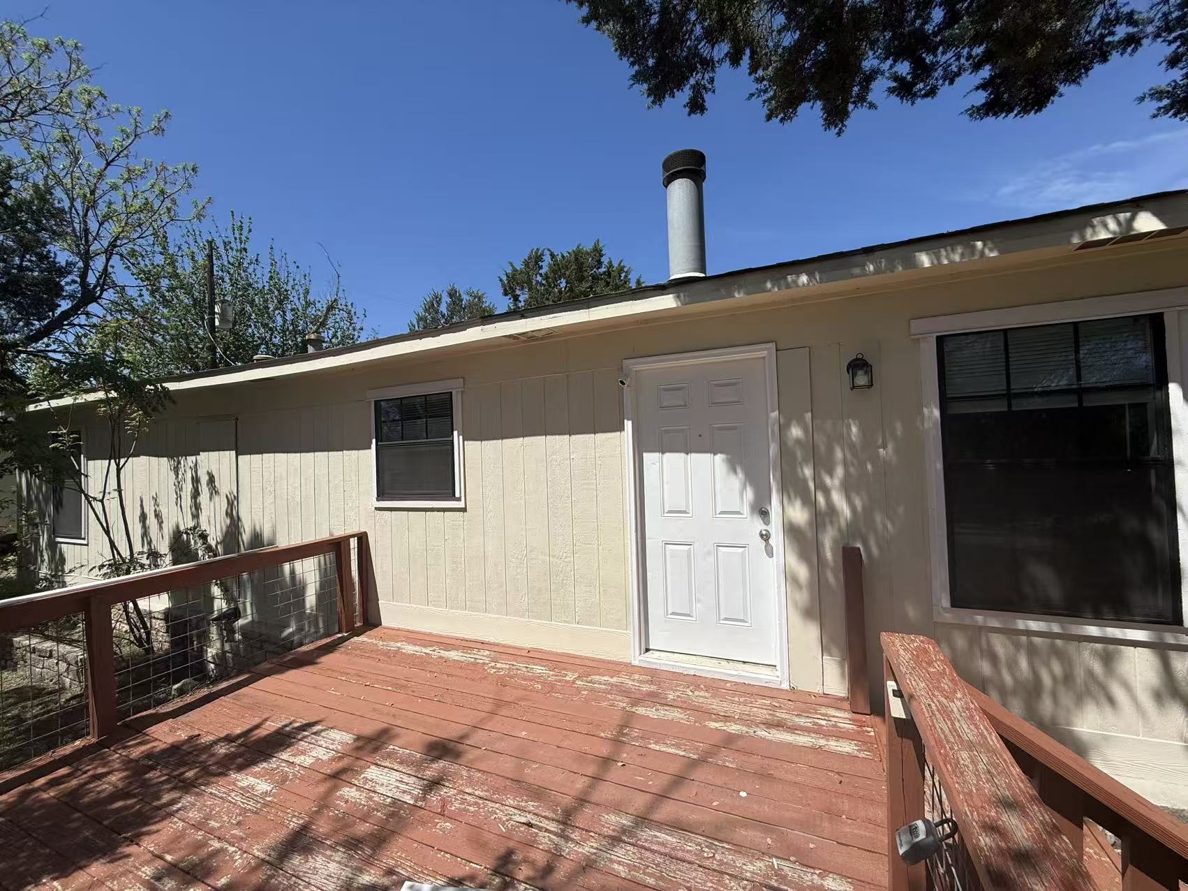 23393 Nameless Road, Unit 113 Leander, TX 78641 - Photo 1 of 16 View of wooden deck