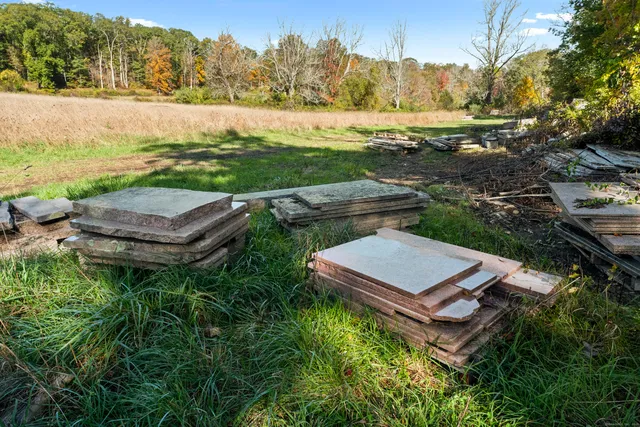 a view of a green field with clear sky