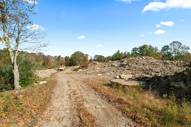 a house with trees in the background