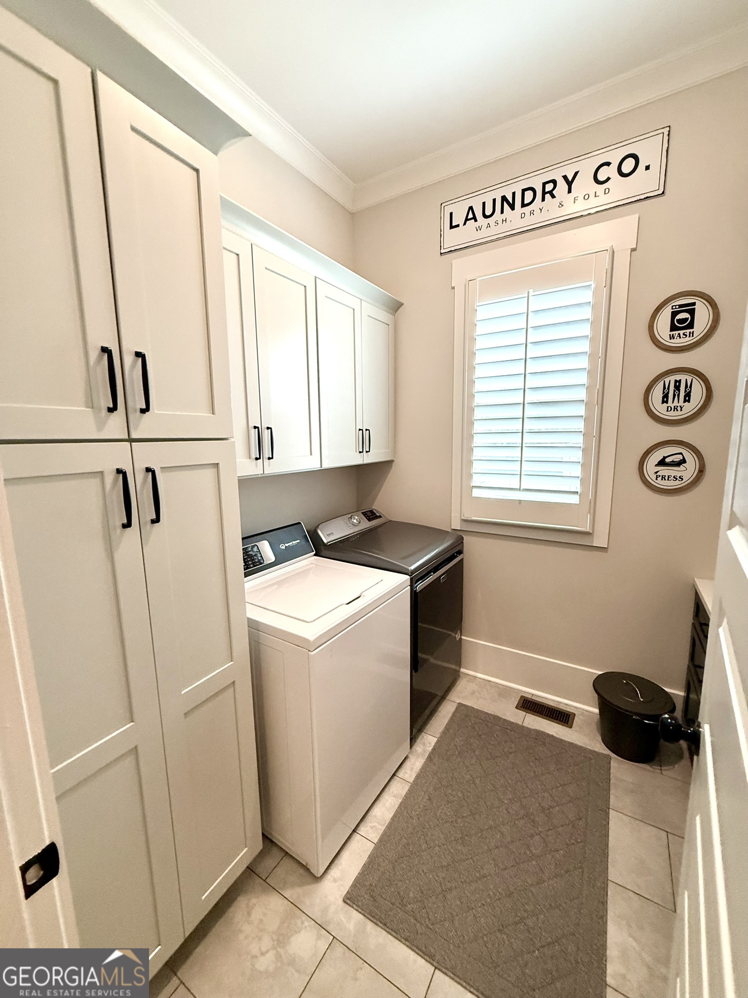 120 Spring Creek Drive Rutledge, GA 30663 - Photo 16 of 38 a room with a washer and dryer