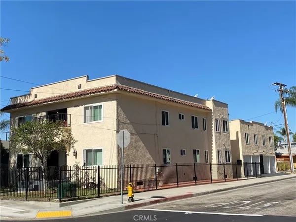 a view of a building with a street
