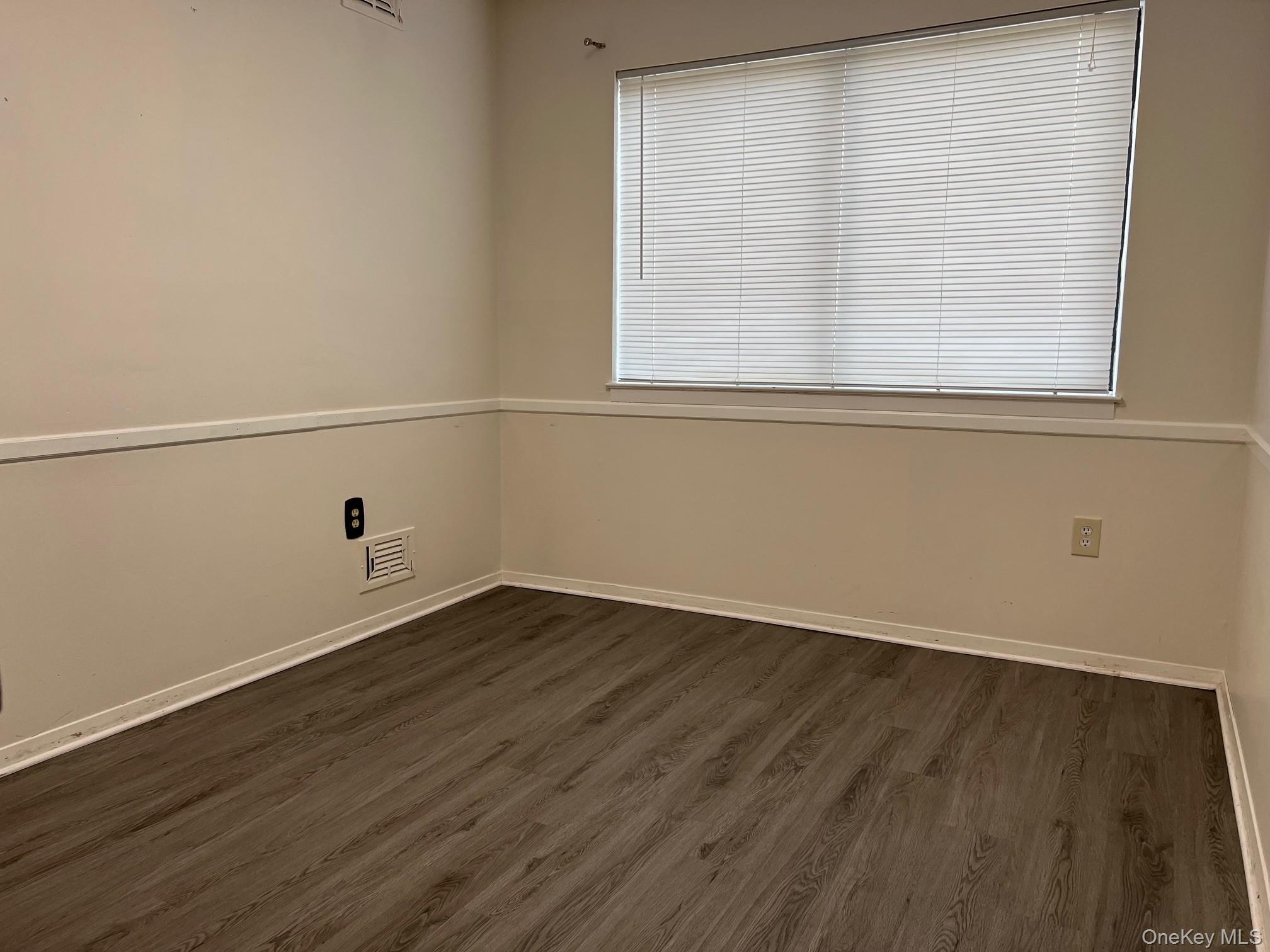 1006 Holly Walk Poughkeepsie, NY 12603 - Photo 5 of 18 Spare room featuring dark wood finished floors and baseboards