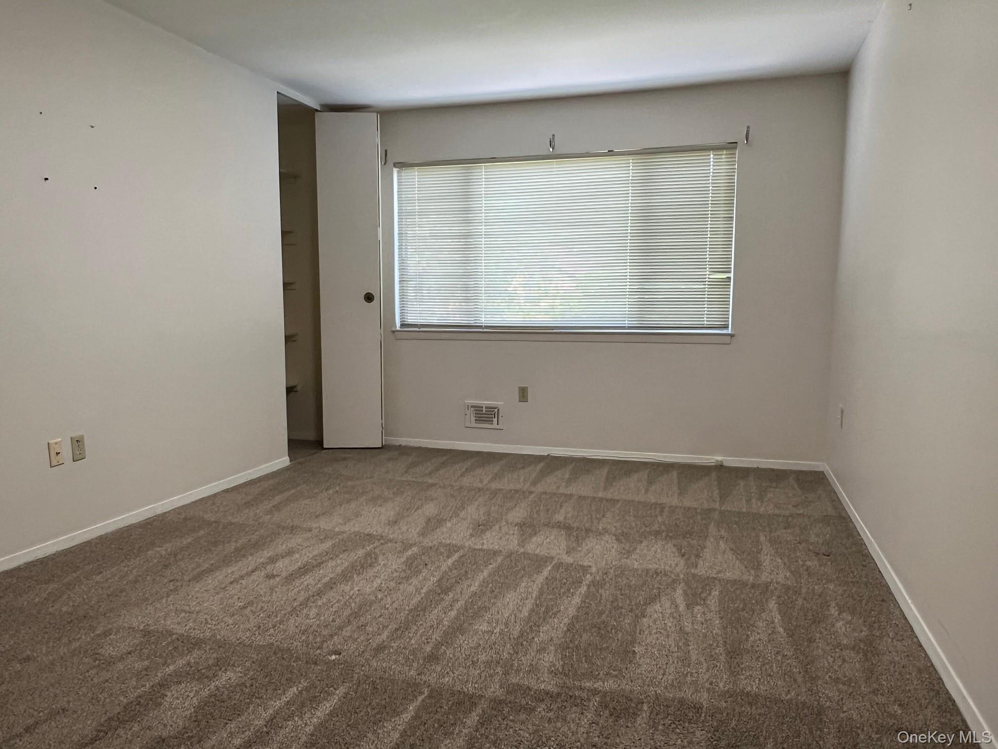 1006 Holly Walk Poughkeepsie, NY 12603 - Photo 10 of 18 Spare room with carpet flooring and baseboards