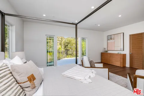 a bathroom with a granite countertop toilet a sink and bathtub