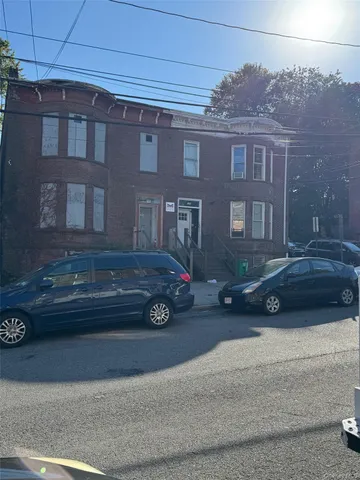 a car parked in front of a building