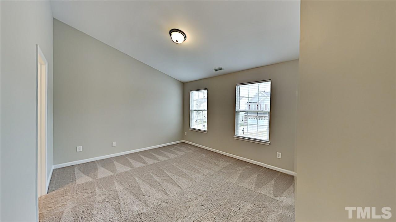 2238 Stoney Spring Drive Raleigh, NC 27610 - Photo 6 of 11 a view of an empty room with a window