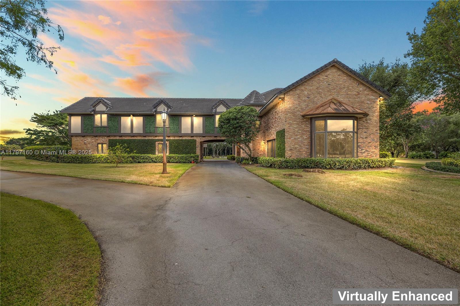 a view of house with a yard
