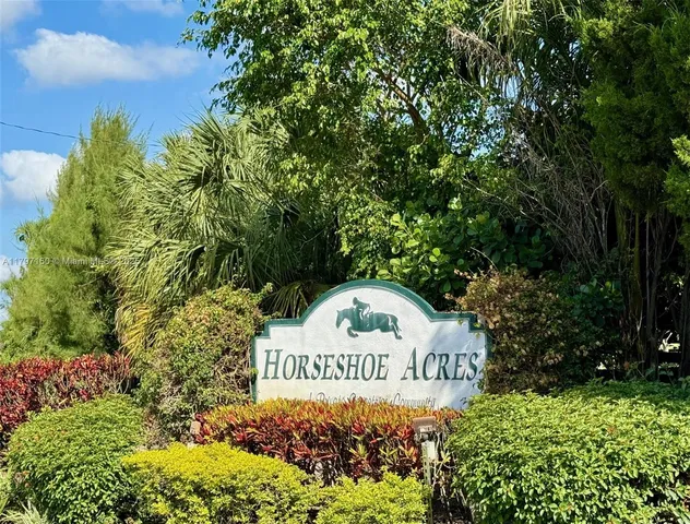 a sign on the side of a road