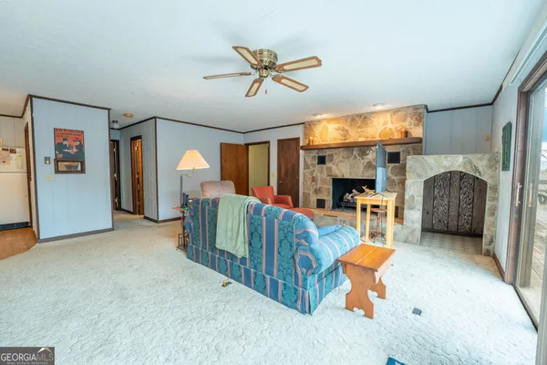 a bed room with furniture and a chandelier