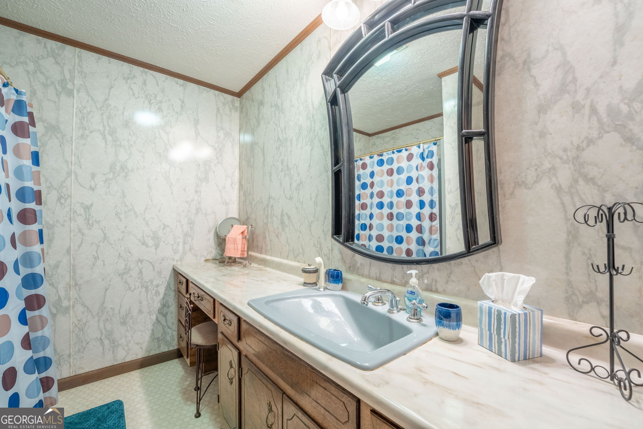 375 Western Way Rabun Gap, GA 30568 - Photo 21 of 51 a bathroom with a sink mirror and a shower