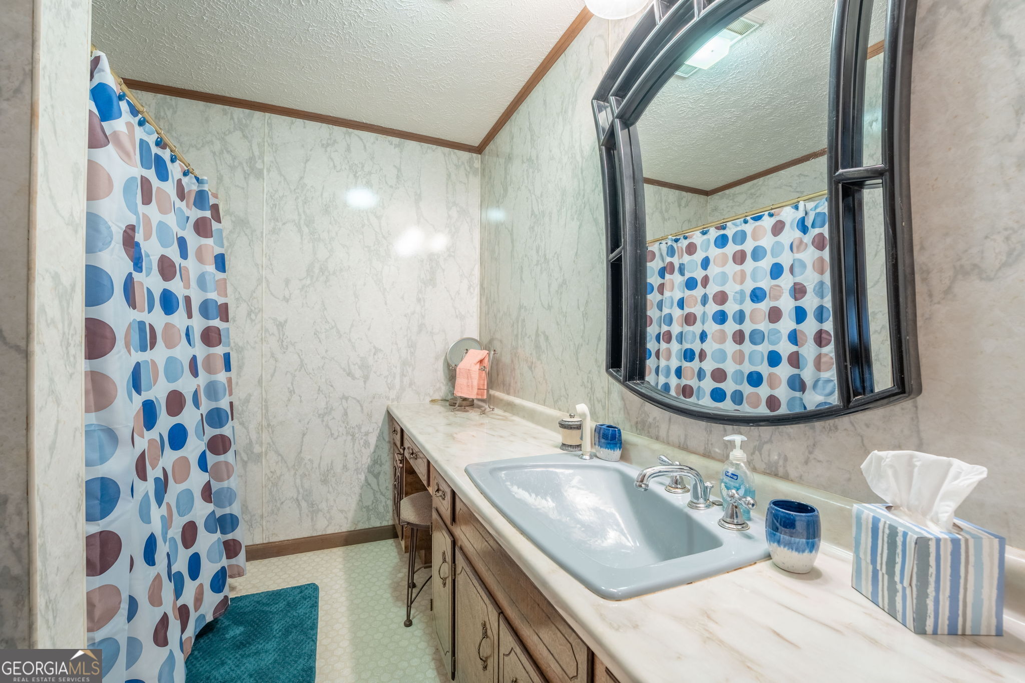 375 Western Way Rabun Gap, GA 30568 - Photo 22 of 51 a bathroom with a sink toilet and shower