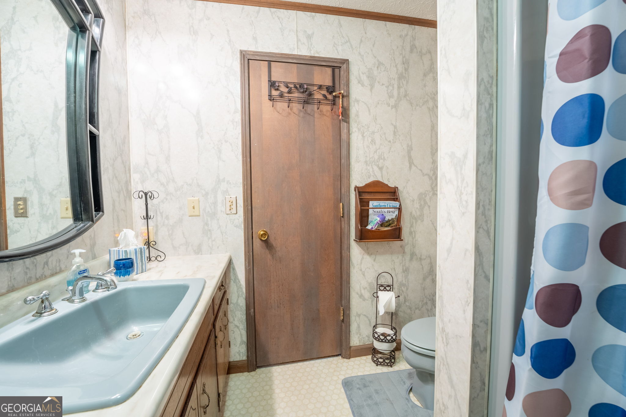 375 Western Way Rabun Gap, GA 30568 - Photo 23 of 51 a bathroom with a sink a toilet and shower