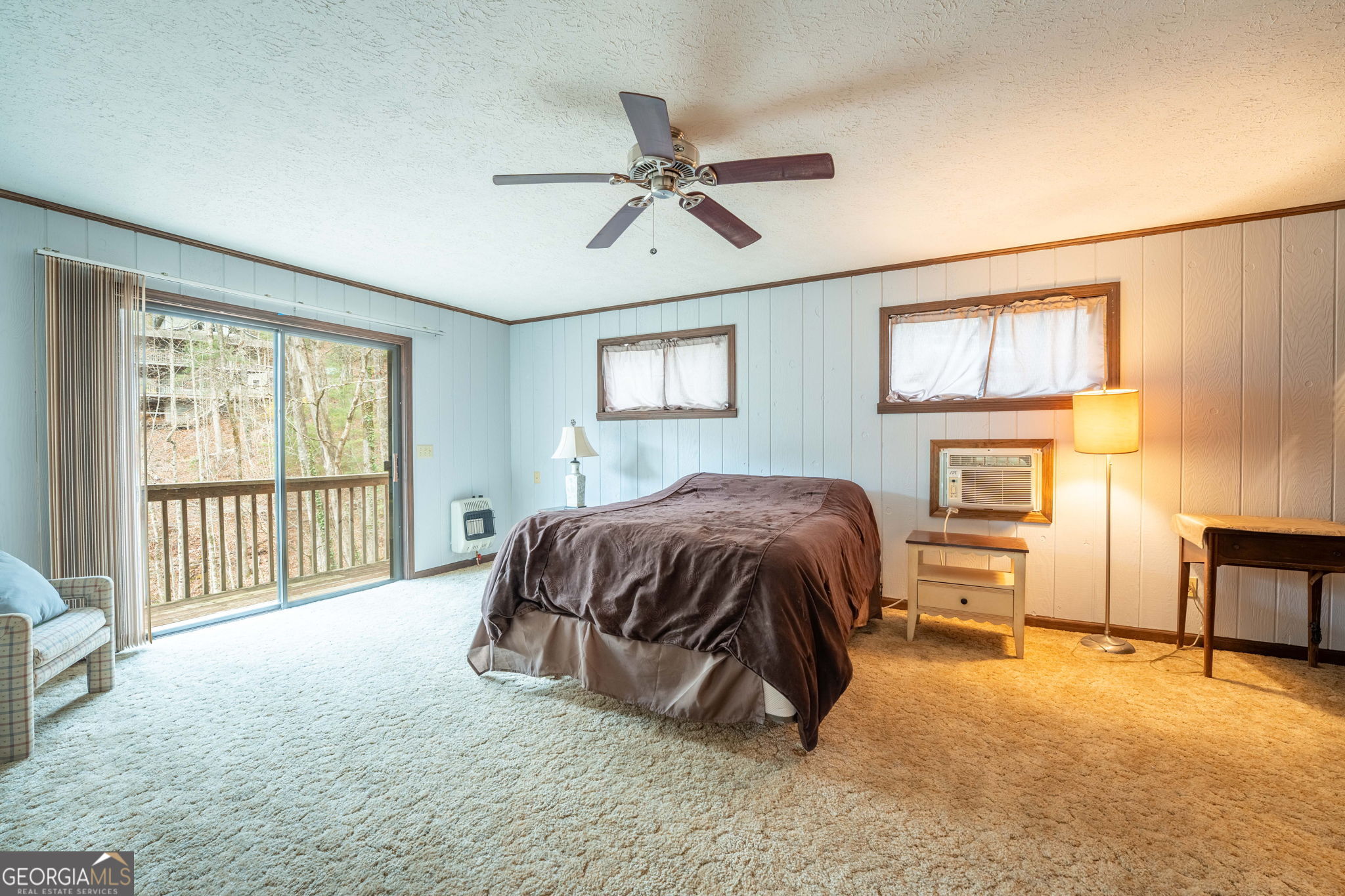 375 Western Way Rabun Gap, GA 30568 - Photo 24 of 51 a bedroom with a bed and window