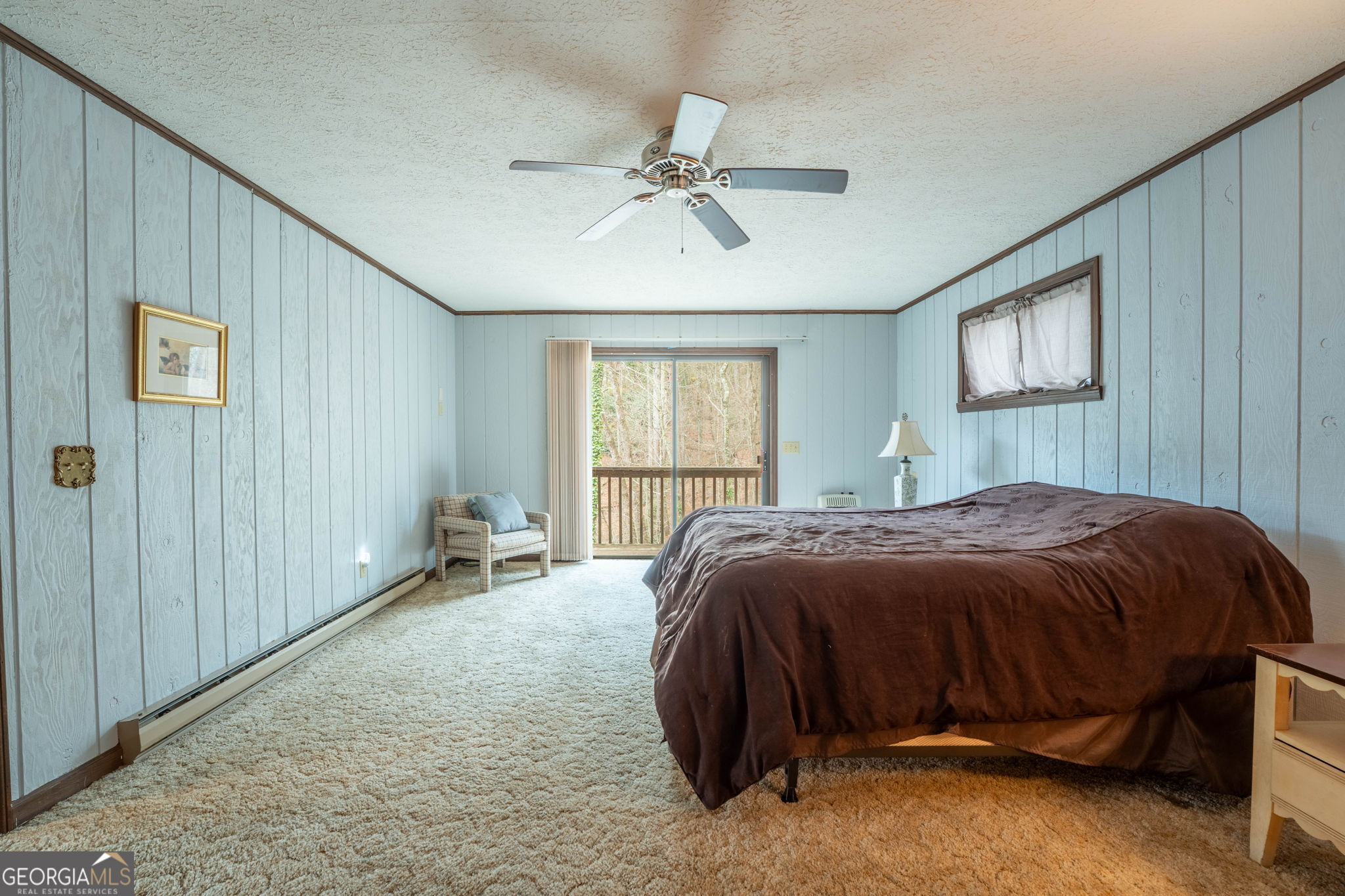 375 Western Way Rabun Gap, GA 30568 - Photo 25 of 51 a bedroom with a bed and window