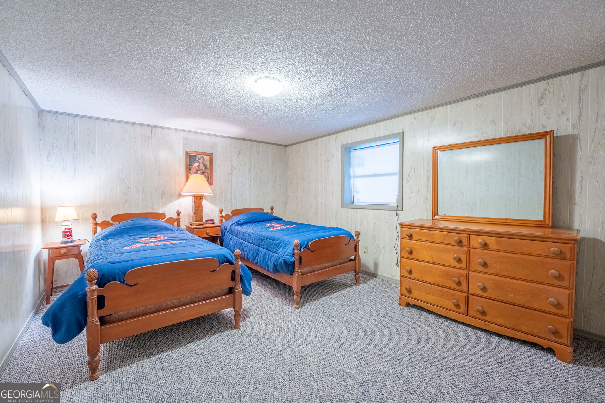 375 Western Way Rabun Gap, GA 30568 - Photo 34 of 51 a bedroom with furniture and a window