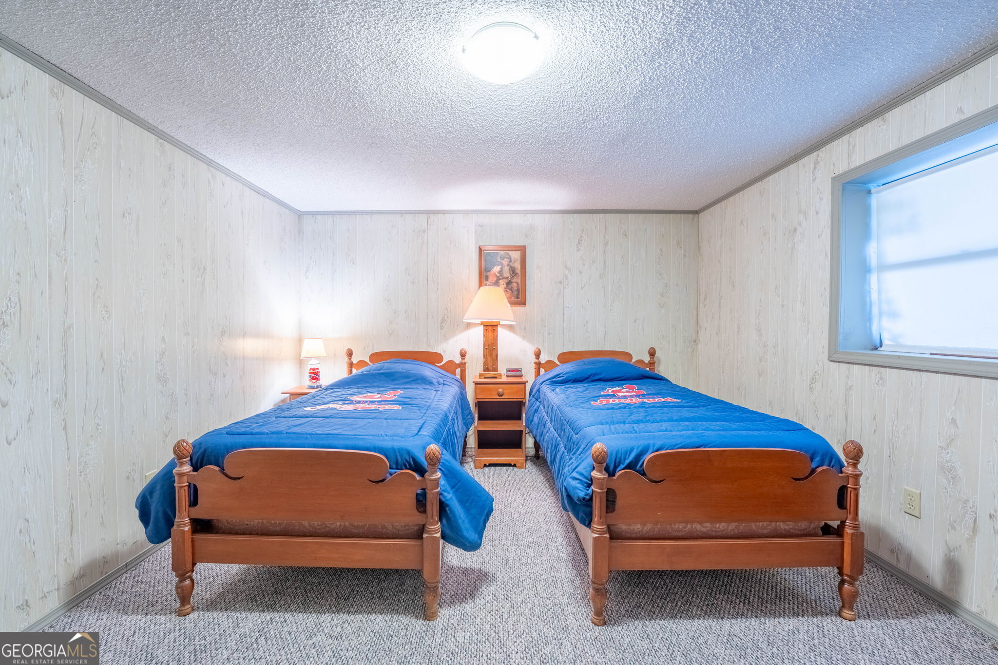 375 Western Way Rabun Gap, GA 30568 - Photo 35 of 51 a bedroom with two beds and a window