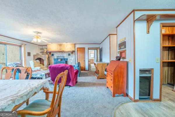 a living room filled with furniture and a couch