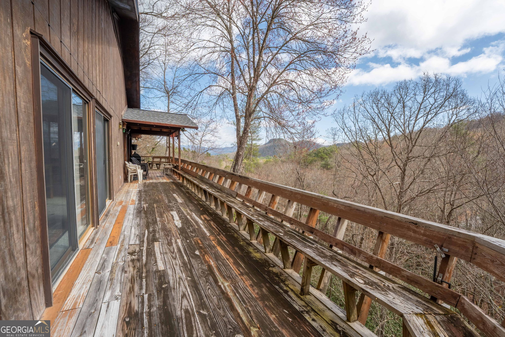 375 Western Way Rabun Gap, GA 30568 - Photo 50 of 51 a view of balcony with wooden floor and fence and floor