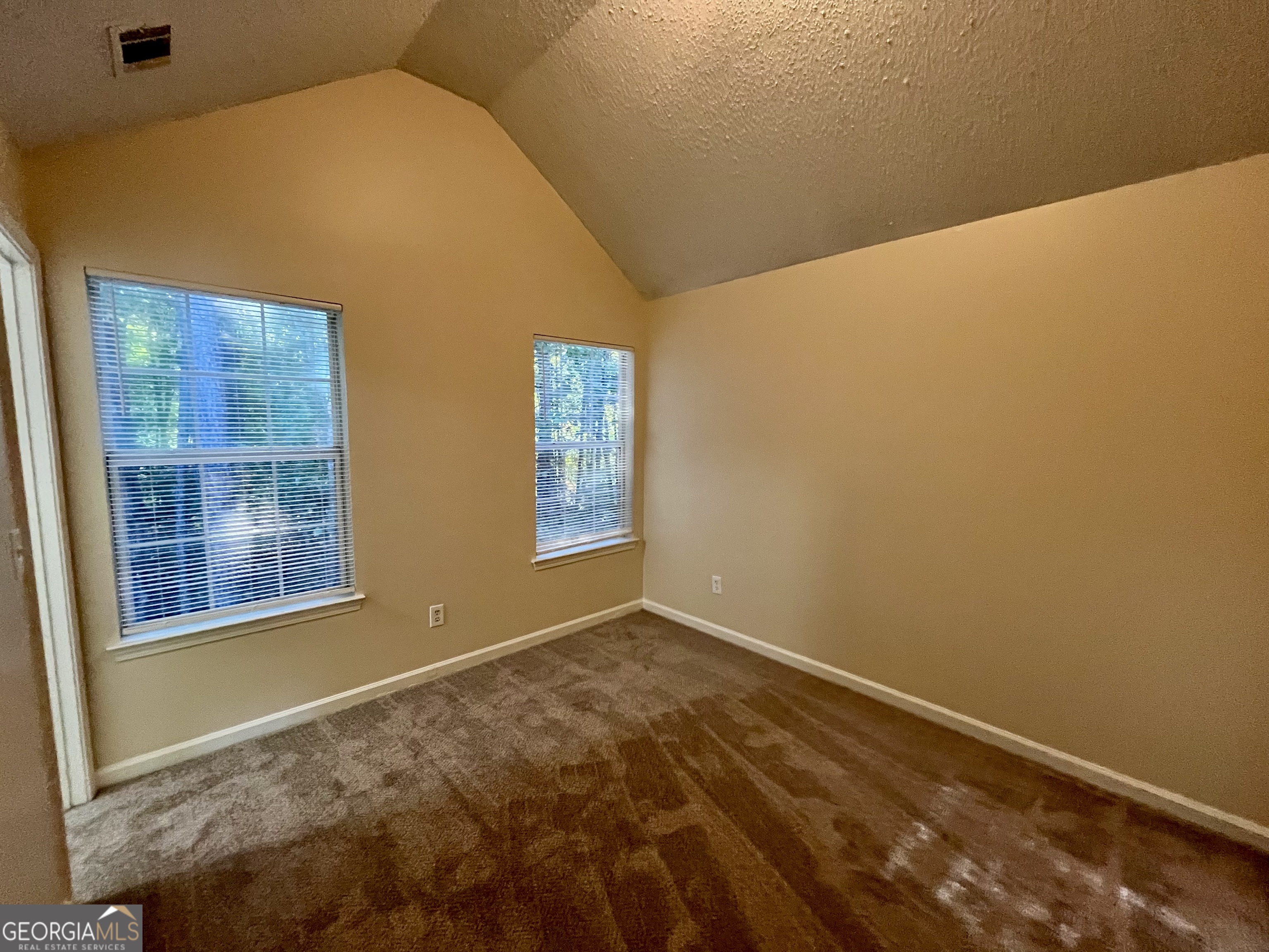 260 Windscape Drive Covington, GA 30016 - Photo 14 of 14 a view of room and window