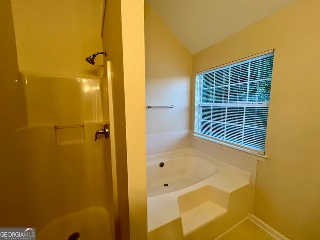 a bathroom with a tub