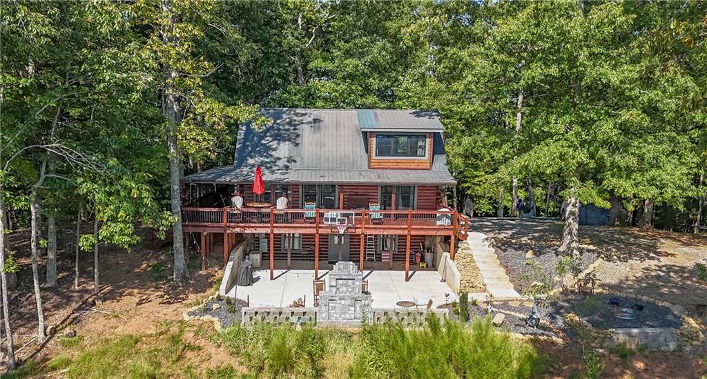 832 Scenic Mountain View Road Blue Ridge, GA 30513 - Photo 48 of 56 a view of a house with roof deck