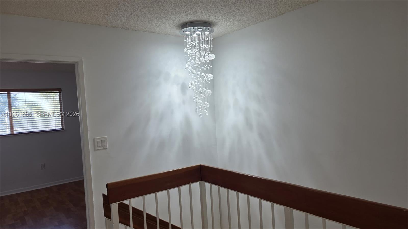 14905 Southwest 80th Street, Unit 217 Miami, FL 33193 - Photo 22 of 25 a view of a hallway with windows