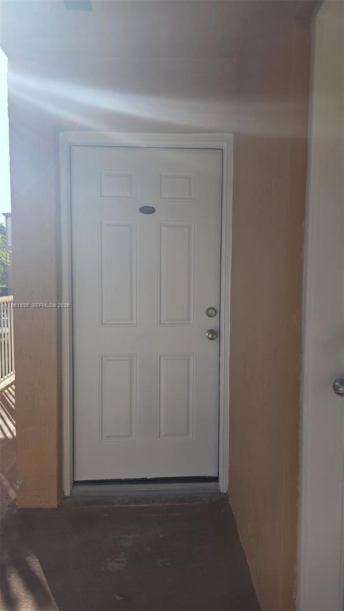 14905 Southwest 80th Street, Unit 217 Miami, FL 33193 - Photo 3 of 25 a view of door