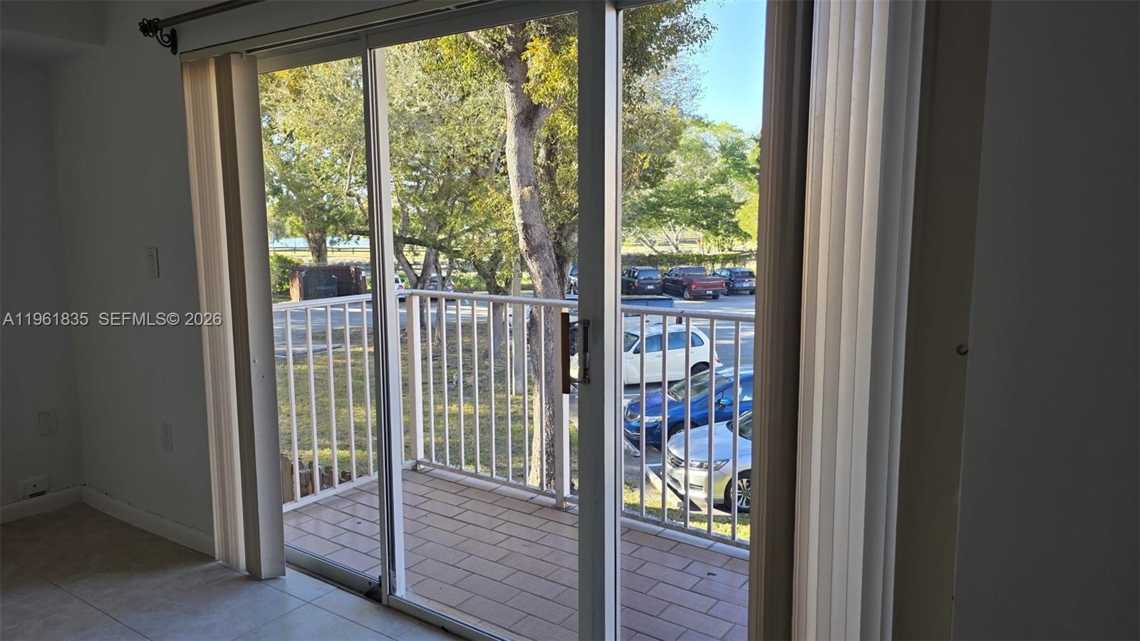 14905 Southwest 80th Street, Unit 217 Miami, FL 33193 - Photo 9 of 25 a view of staircase with large window